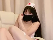 アジアのスキニーマスクガールセクシーなナースユニフォーム
